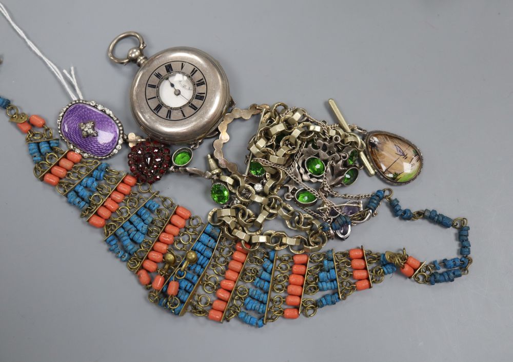 A 1950 silver, enamel and paste set brooch, a green paste necklace and other jewellery